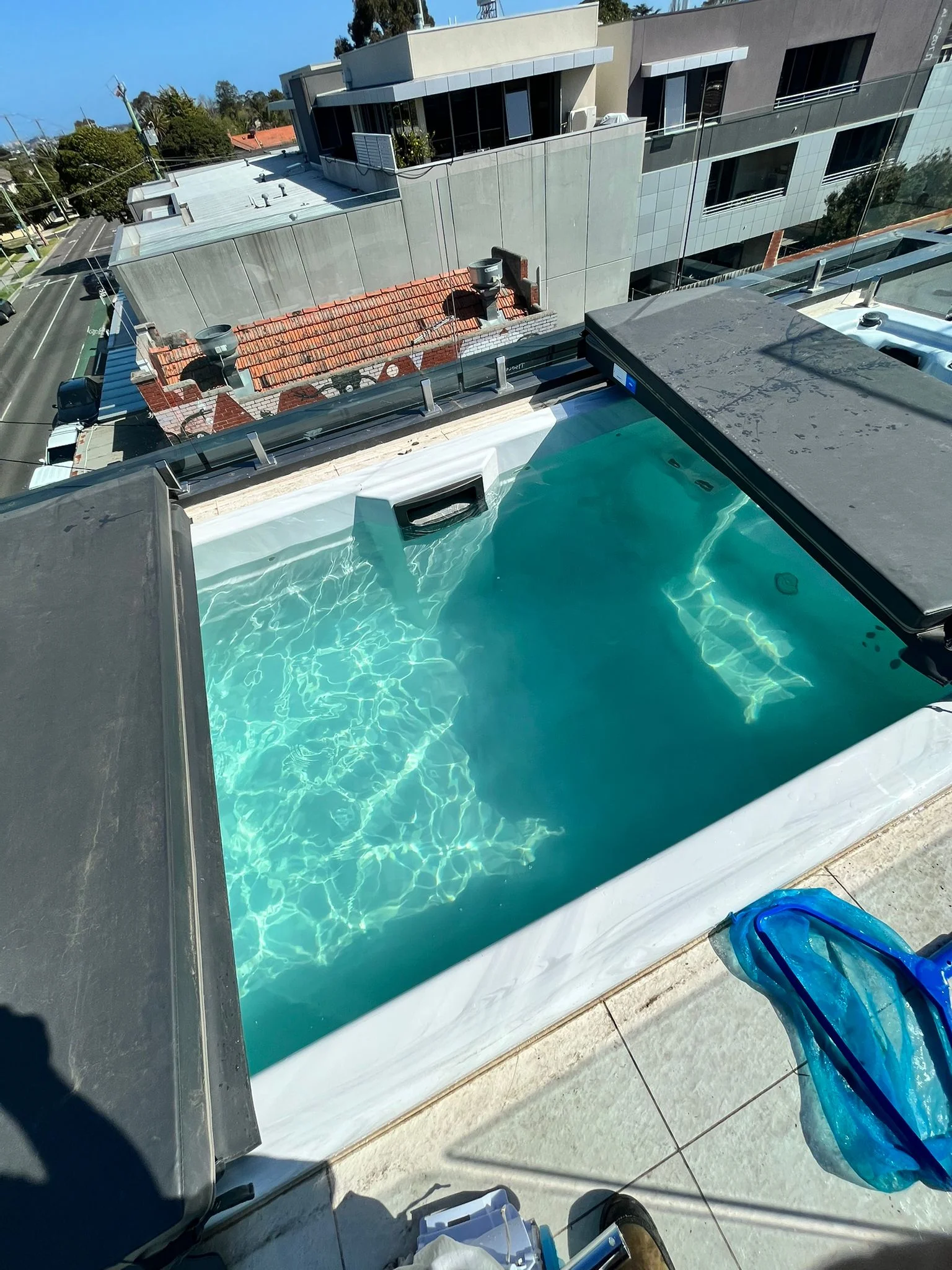 Pool cleaning technician at a Burwood East home